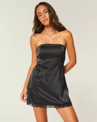Abito aderente con fiocco senza spalline in raso
