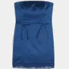 Abito aderente con fiocco senza spalline in raso