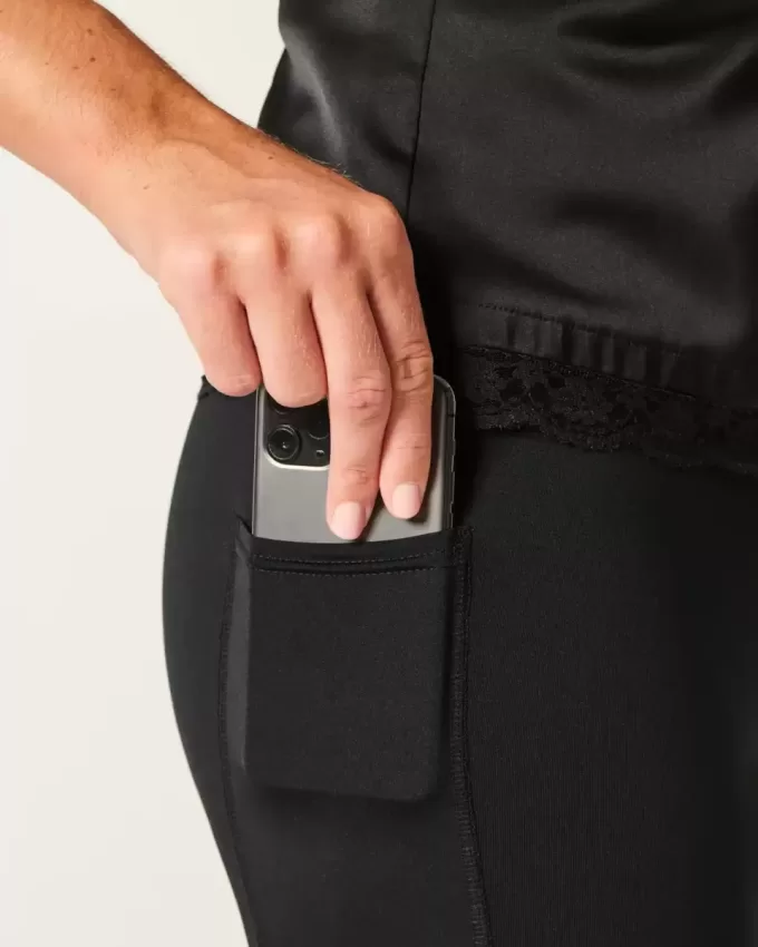 Abito aderente con fiocco senza spalline in raso