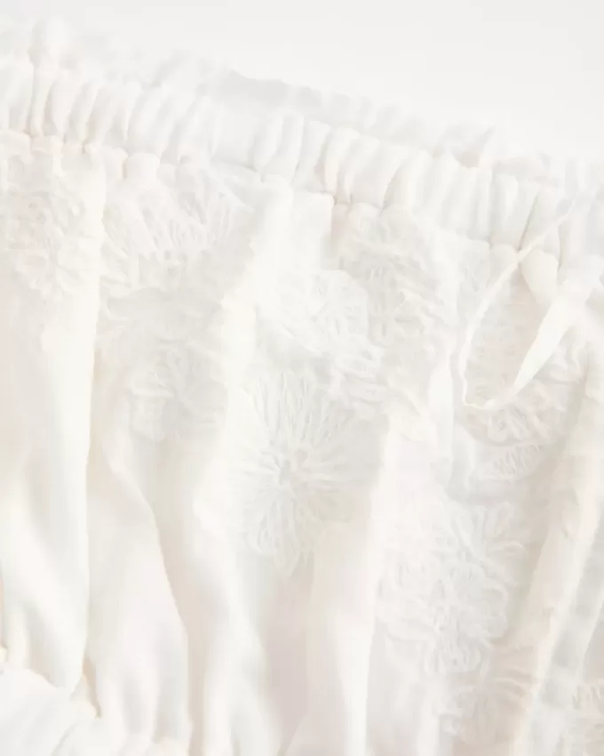 Abito babydoll ricamato senza spalline