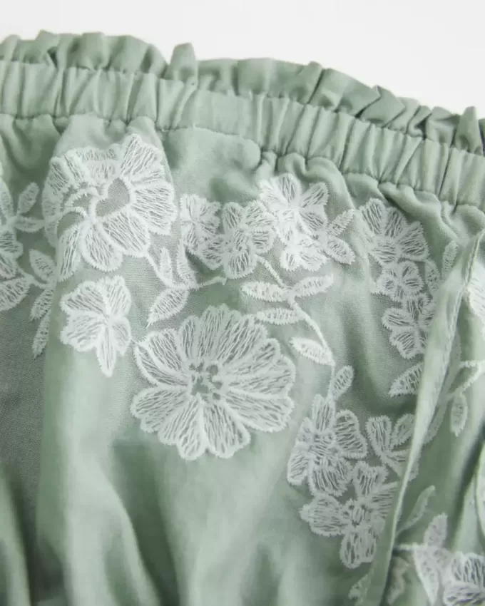 Abito babydoll ricamato senza spalline