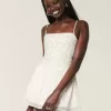 Abito gonna-pantalone in chiffon