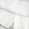 Abito gonna-pantalone in chiffon Abito gonna-pantalone in chiffon