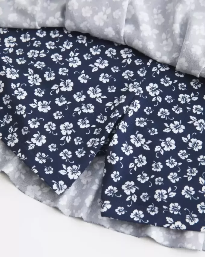 Abito gonna-pantalone in maglia senza spalline