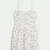Abito gonna-pantalone in misto lino con schiena scoperta Abito gonna-pantalone in misto lino con schiena scoperta