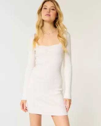 Abito in maglia a maniche lunghe con scollo a V e schiena scoperta