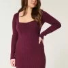 Abito in maglia a maniche lunghe con scollo a V e schiena scoperta Abito in maglia a maniche lunghe con scollo a V e schiena scoperta