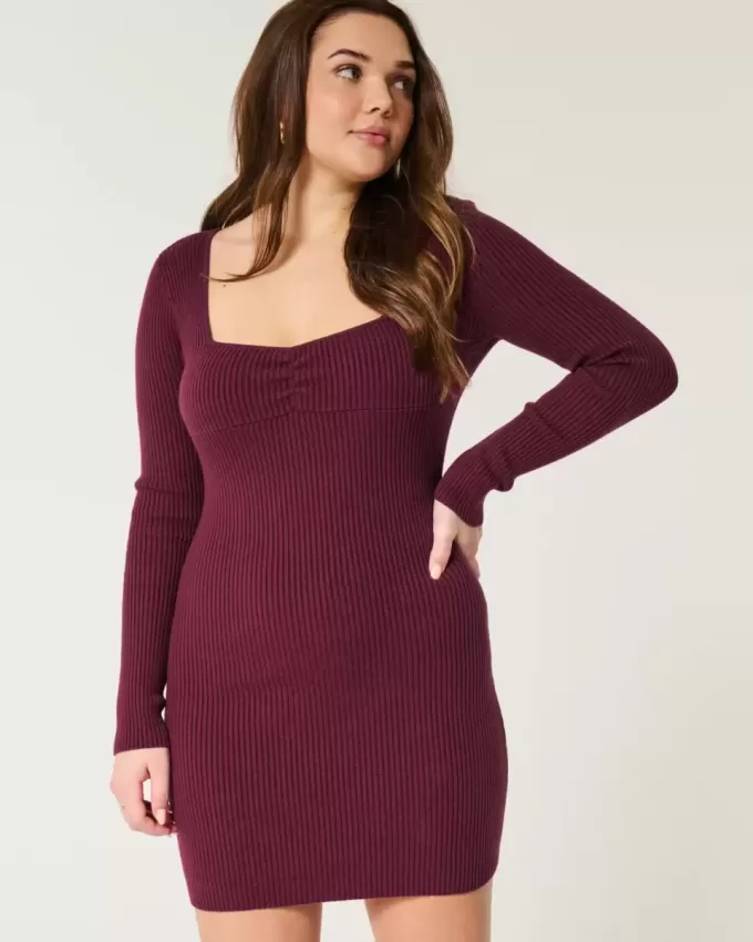 Abito in maglia a maniche lunghe con scollo a V e schiena scoperta Abito in maglia a maniche lunghe con scollo a V e schiena scoperta