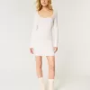 Abito in maglia a maniche lunghe con scollo a V e schiena scoperta