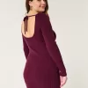 Abito in maglia a maniche lunghe con scollo a V e schiena scoperta Abito in maglia a maniche lunghe con scollo a V e schiena scoperta
