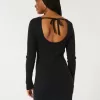 Abito in maglia a maniche lunghe con scollo a V e schiena scoperta