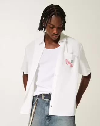 Camicia a maniche corte con stampa di fenicotteri rosa e luna in misto lino