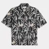 Camicia in misto lino con motivo a pesci tropicali squadrati