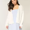 Cardigan con maniche in pizzo senza chiusura