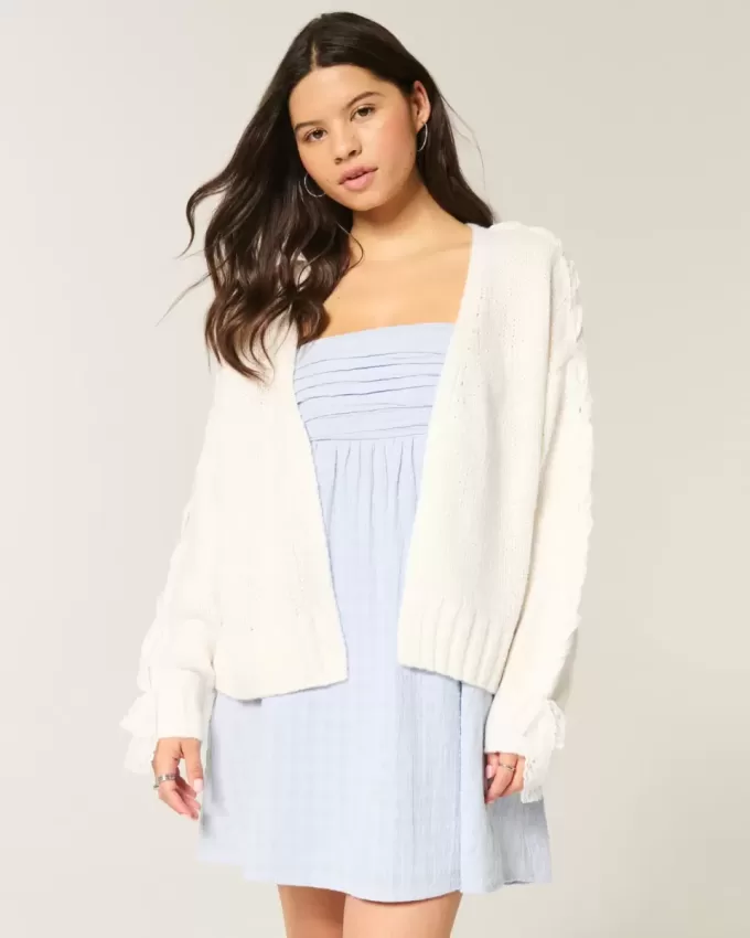 Cardigan con maniche in pizzo senza chiusura
