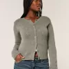 Cardigan con occhielli
