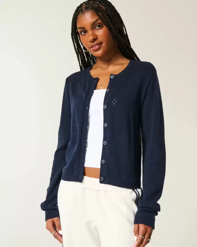 Cardigan con occhielli