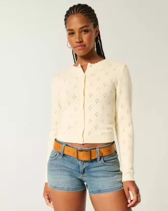 Cardigan con occhielli