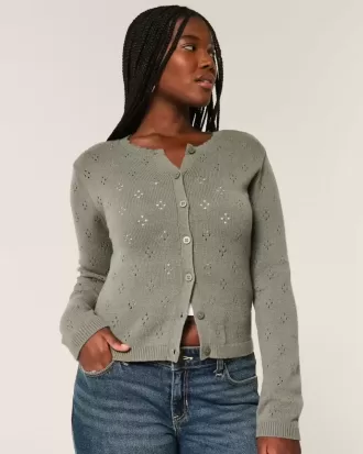 Cardigan con occhielli