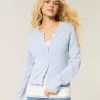 Cardigan con occhielli Cardigan con occhielli