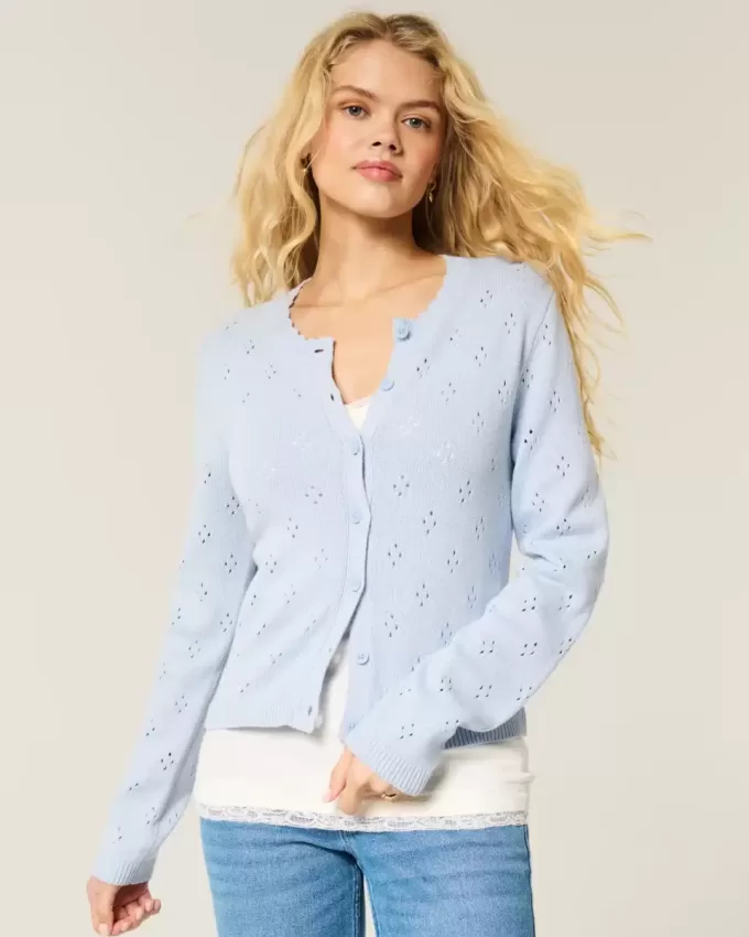 Cardigan con occhielli Cardigan con occhielli