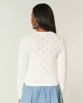 Cardigan con occhielli