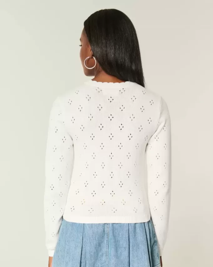 Cardigan con occhielli
