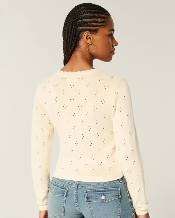 Cardigan con occhielli