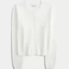 Cardigan con occhielli