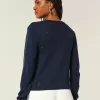 Cardigan con occhielli