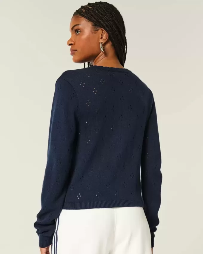 Cardigan con occhielli