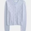 Cardigan con occhielli Cardigan con occhielli