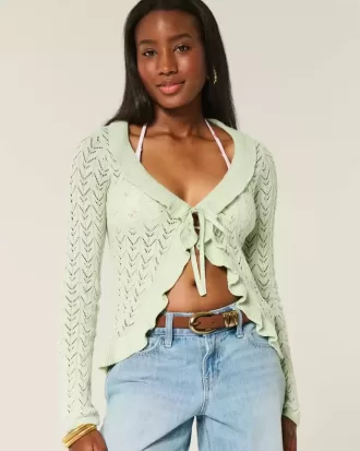 Cardigan con volant e nodo sul davanti