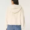 Felpa con cappuccio e cerniera in pelliccia sintetica