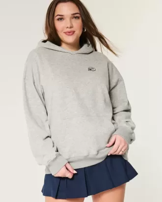 Felpa con cappuccio oversize con grafica da football