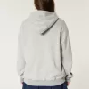 Felpa con cappuccio oversize con grafica da football