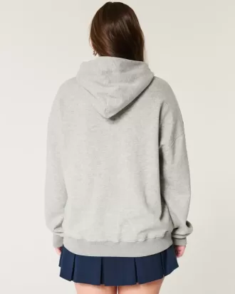 Felpa con cappuccio oversize con grafica da football