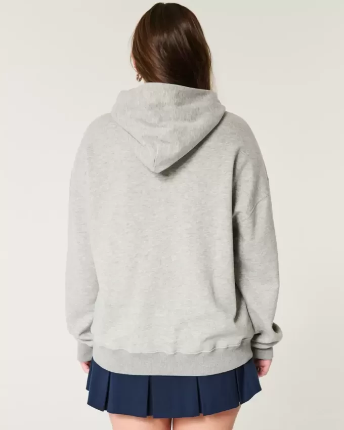 Felpa con cappuccio oversize con grafica da football