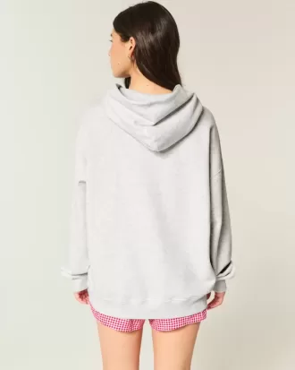 Felpa con cappuccio oversize con grafica universitaria