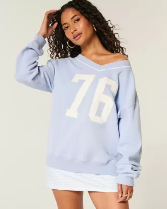 Felpa con scollo a V e grafica con numeri oversize