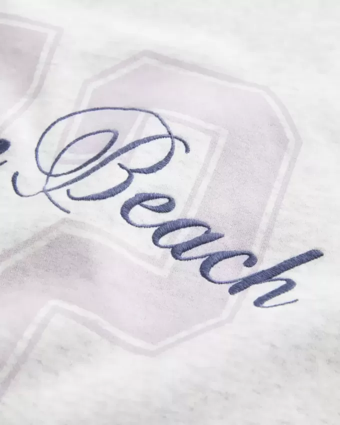 Felpa girocollo oversize con grafica Ocean Beach
