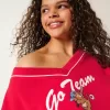 Felpa oversize con scollo a V e grafica Go Team