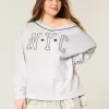 Felpa oversize con scollo a V e grafica NYC