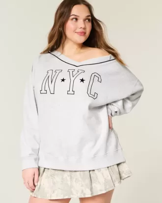 Felpa oversize con scollo a V e grafica NYC