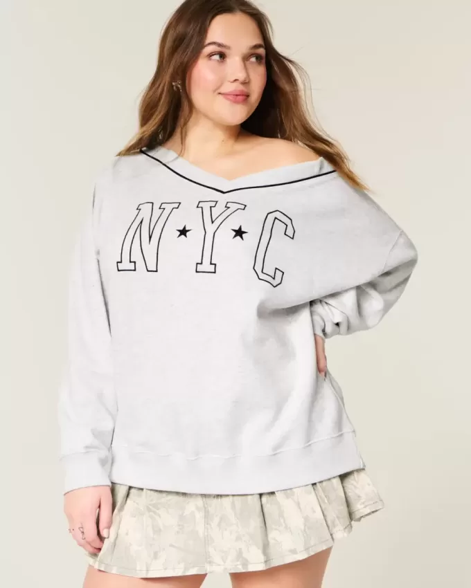 Felpa oversize con scollo a V e grafica NYC