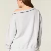 Felpa oversize con scollo a V e grafica NYC
