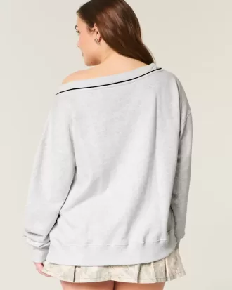 Felpa oversize con scollo a V e grafica NYC