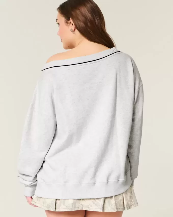 Felpa oversize con scollo a V e grafica NYC