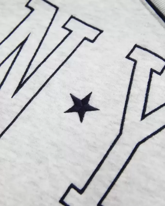 Felpa oversize con scollo a V e grafica NYC