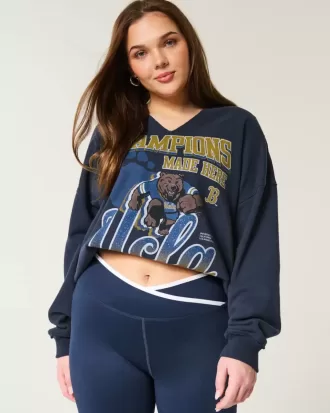 Felpa oversize con scollo a V e grafica UCLA
